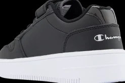 Hot czarne sneakersy dziecięce na białej podeszwie Dzieci Sportowe|Do Szkoły